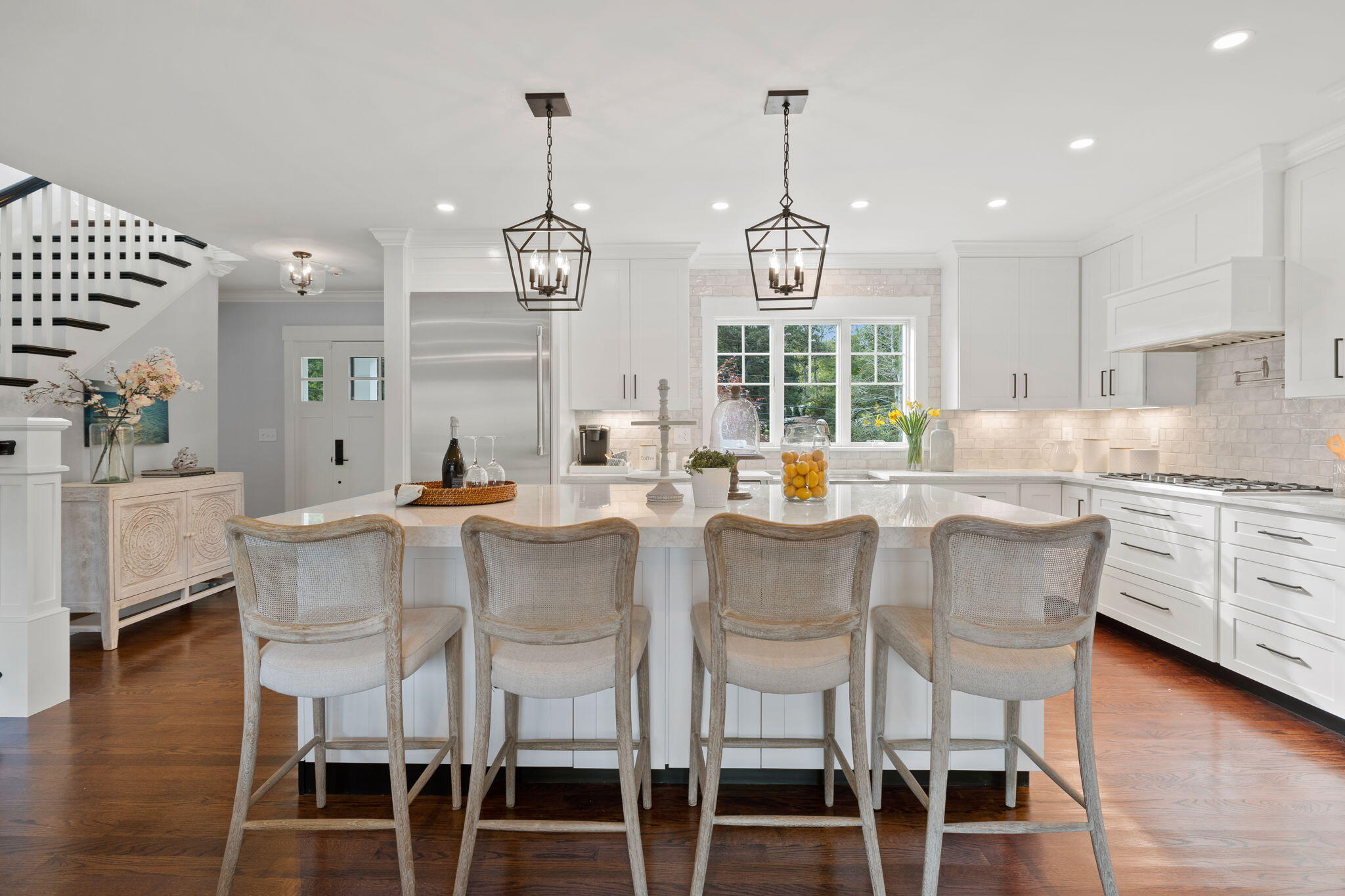 76 Old Mill Road Osterville, MA 02655 - Photo 18 of 45 a view of a dining room with furniture wooden floor and chandelier