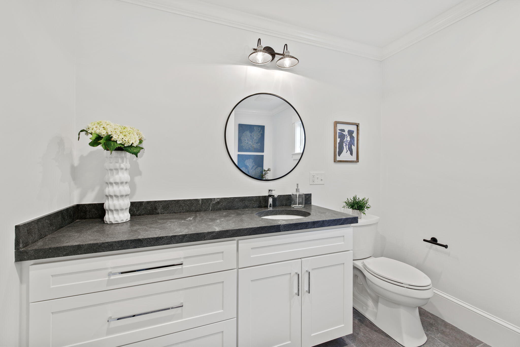 76 Old Mill Road Osterville, MA 02655 - Photo 25 of 45 a bathroom with a granite countertop toilet sink and mirror