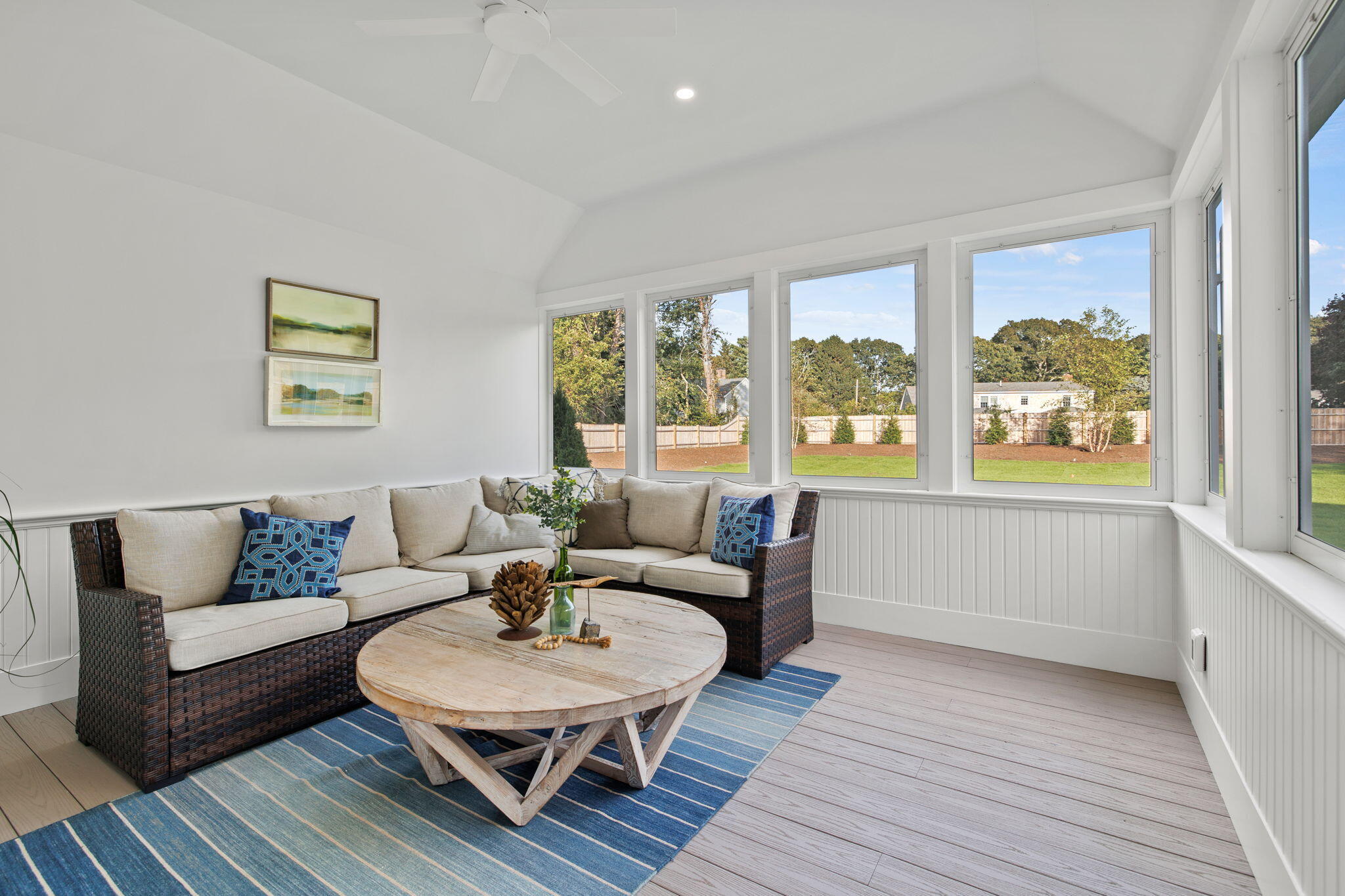 76 Old Mill Road Osterville, MA 02655 - Photo 27 of 45 a living room with furniture and a large window