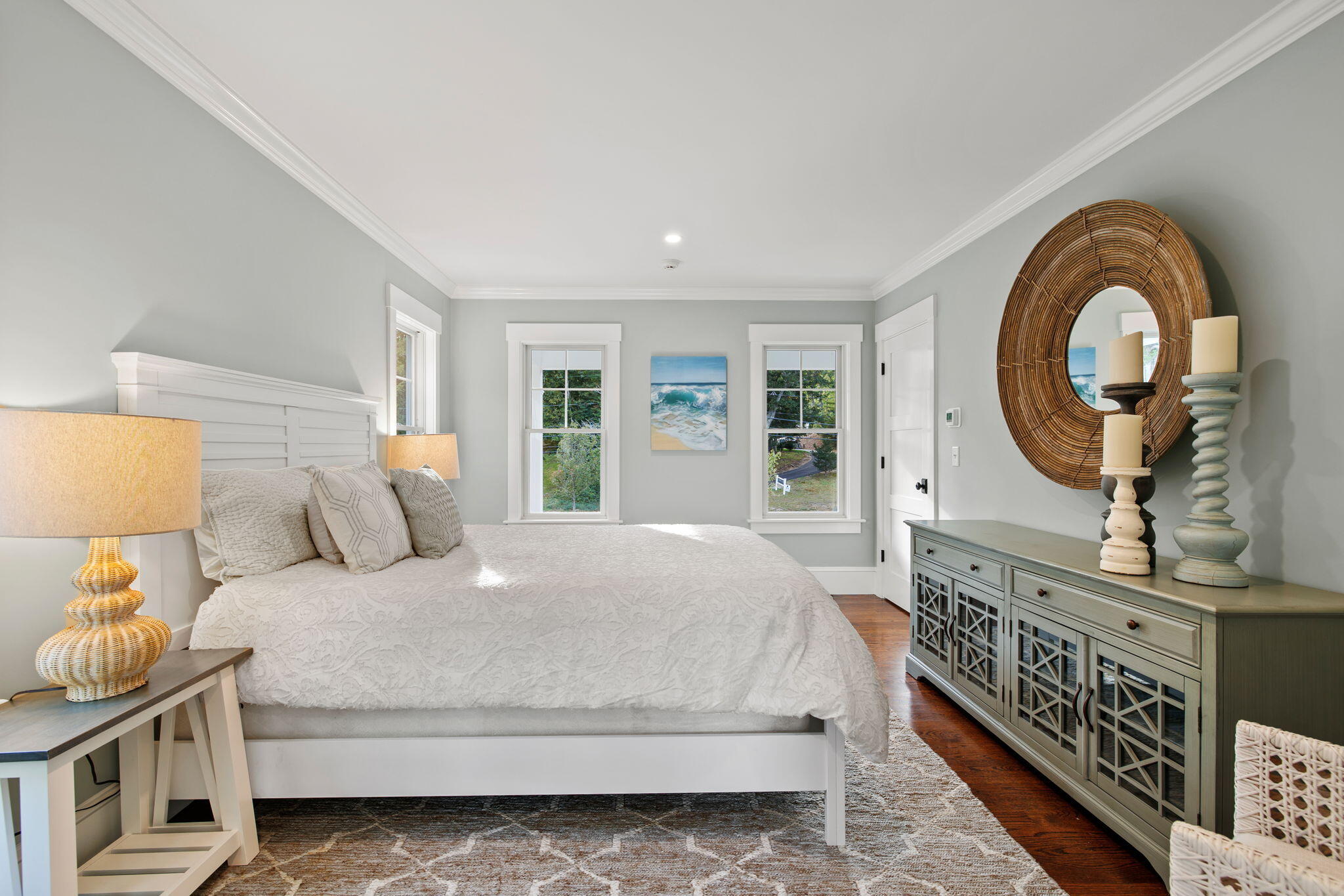 76 Old Mill Road Osterville, MA 02655 - Photo 28 of 45 a bedroom with a bed a mirror on dresser and a window