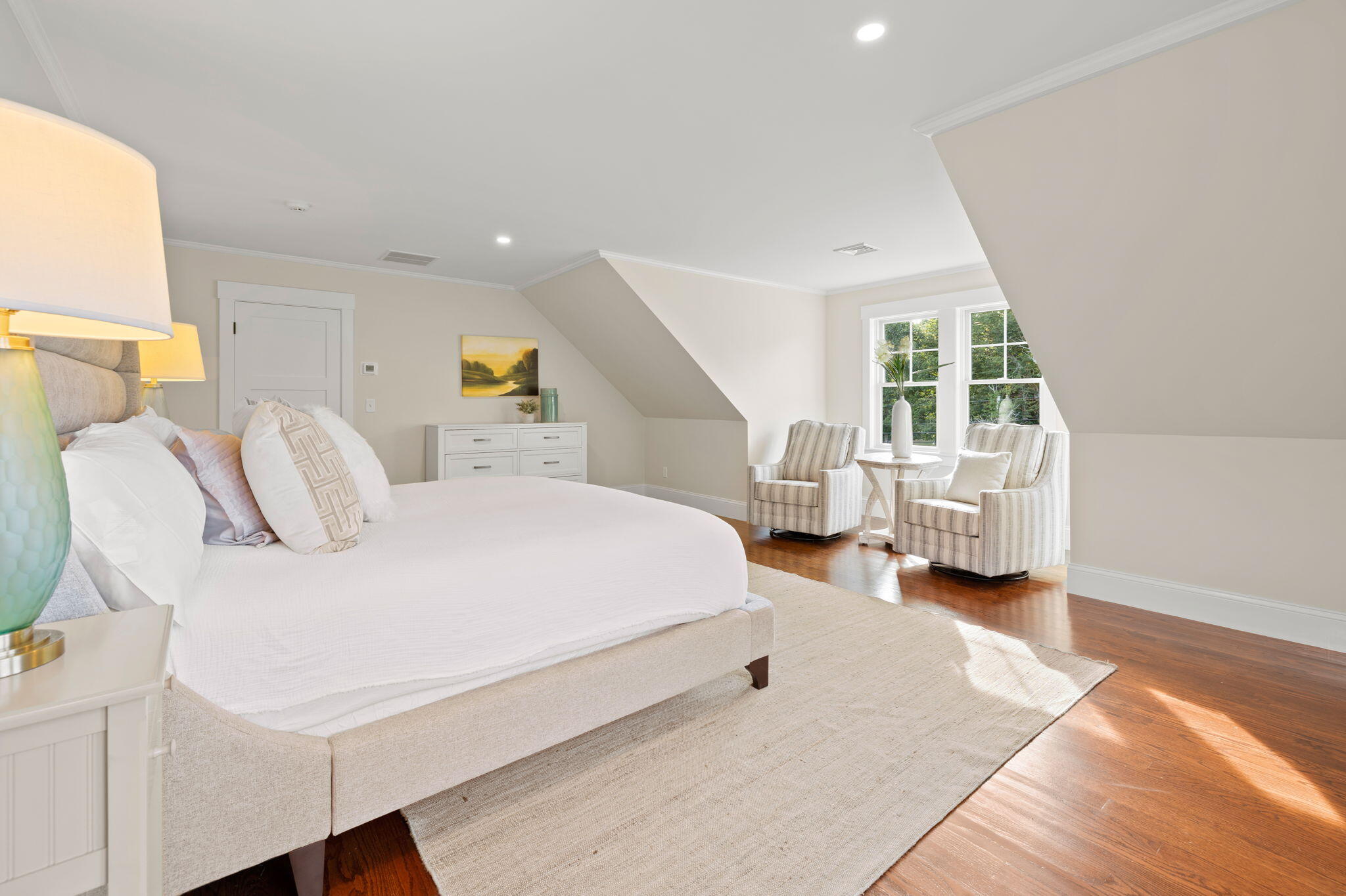 76 Old Mill Road Osterville, MA 02655 - Photo 34 of 45 a spacious bedroom with a bed and a large window