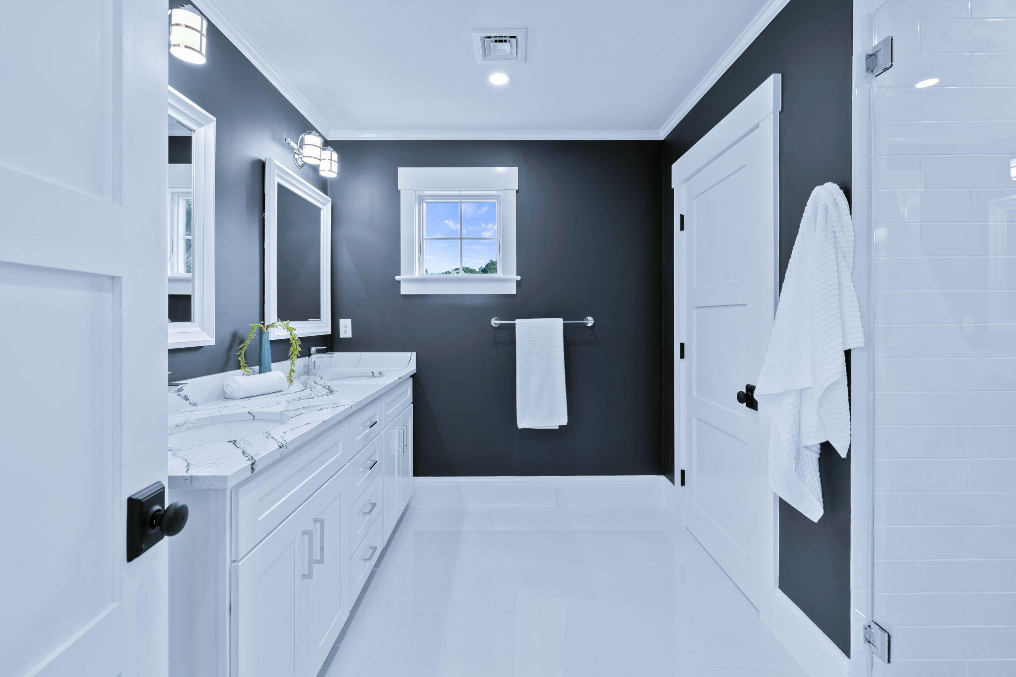 76 Old Mill Road Osterville, MA 02655 - Photo 35 of 45 a spacious bathroom with a double vanity sink a mirror and a shower