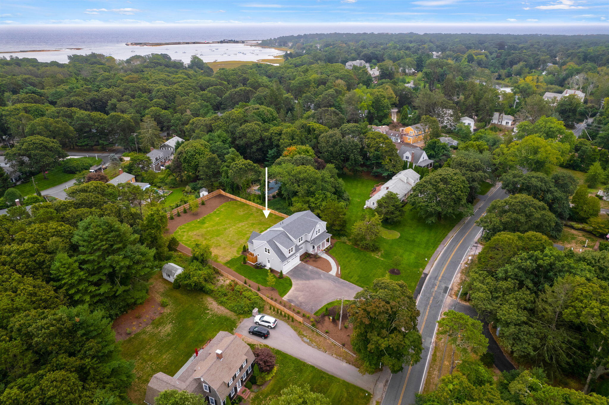 76 Old Mill Road Osterville, MA 02655 - Photo 44 of 45 an aerial view of a house with a yard