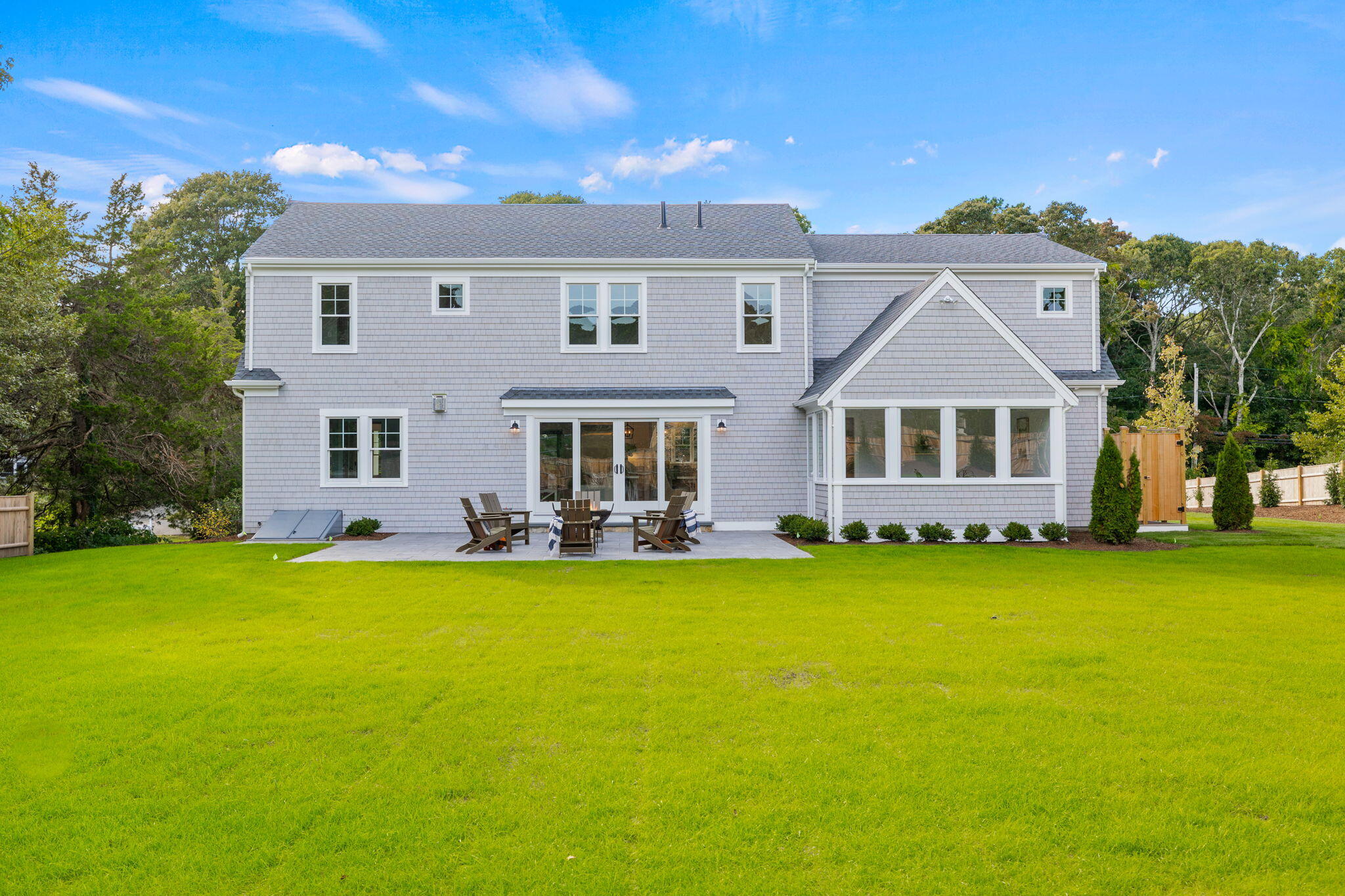 76 Old Mill Road Osterville, MA 02655 - Photo 6 of 45 front view of a house with swimming pool