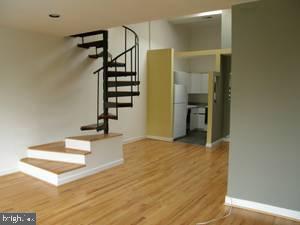 1856 Kalorama Road Northwest, Unit 5 Washington, DC 20009 - Photo 2 of 4 a view of an entryway with wooden floor