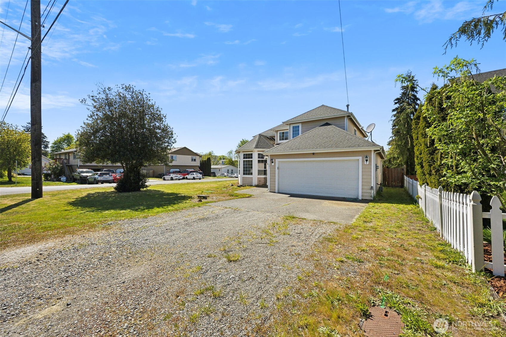201 3rd Street Northeast Yelm, WA 98597 - Photo 28 of 30 a big house with lots of trees