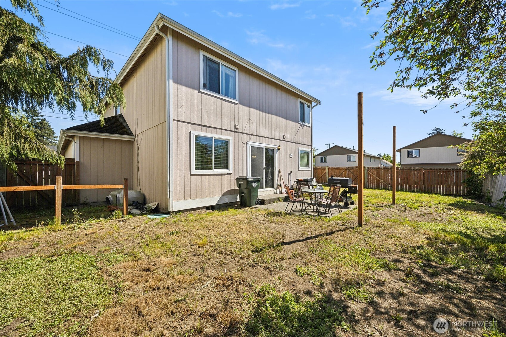 201 3rd Street Northeast Yelm, WA 98597 - Photo 29 of 30 a view of house with backyard and sitting area