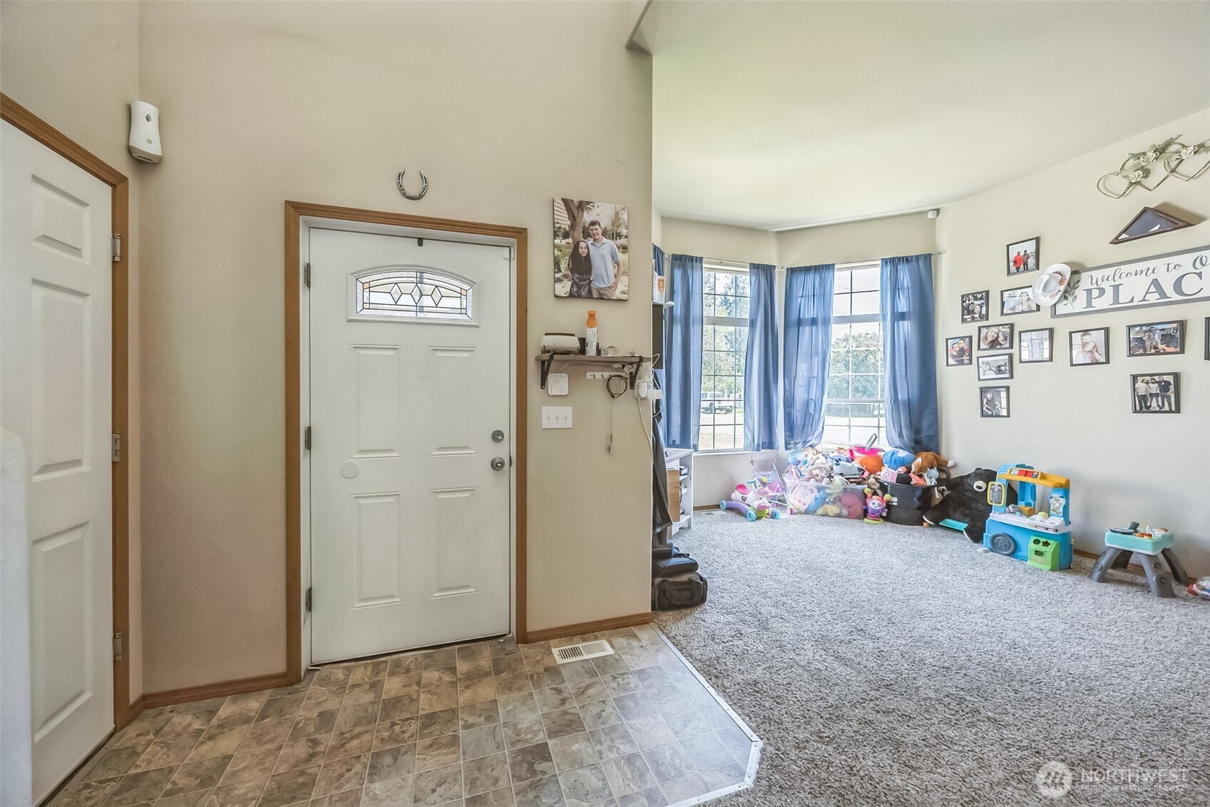 201 3rd Street Northeast Yelm, WA 98597 - Photo 4 of 30 a view of a livingroom with toys