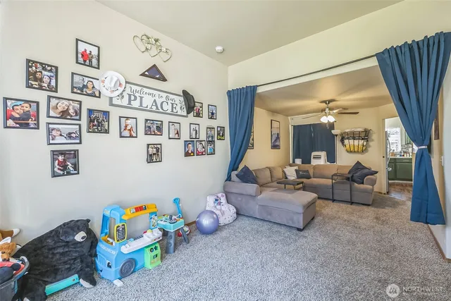 a bedroom with furniture and a wooden floor