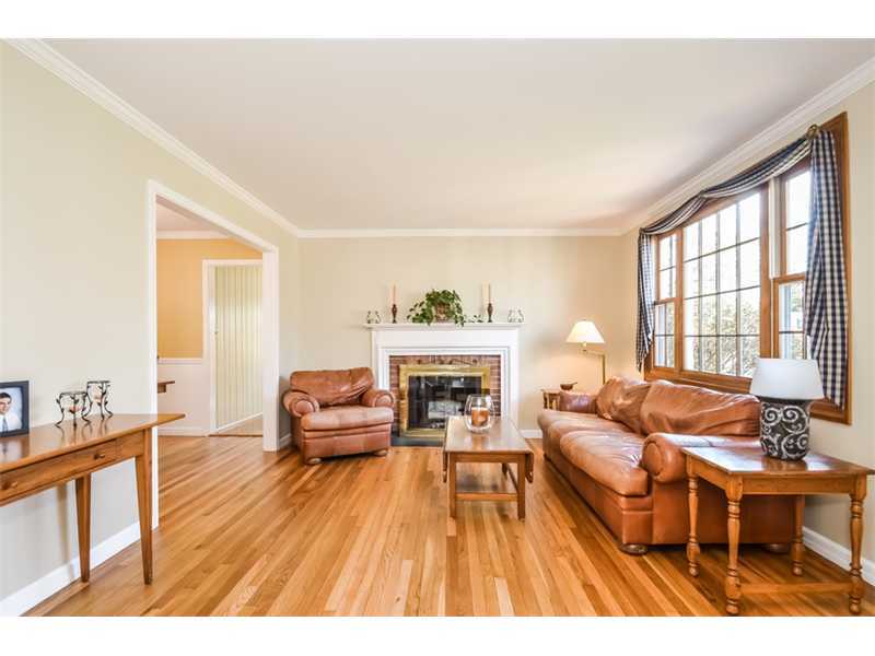 28 Miles Road Darien, CT 06820 - Photo 3 of 15 a living room with furniture and a fireplace