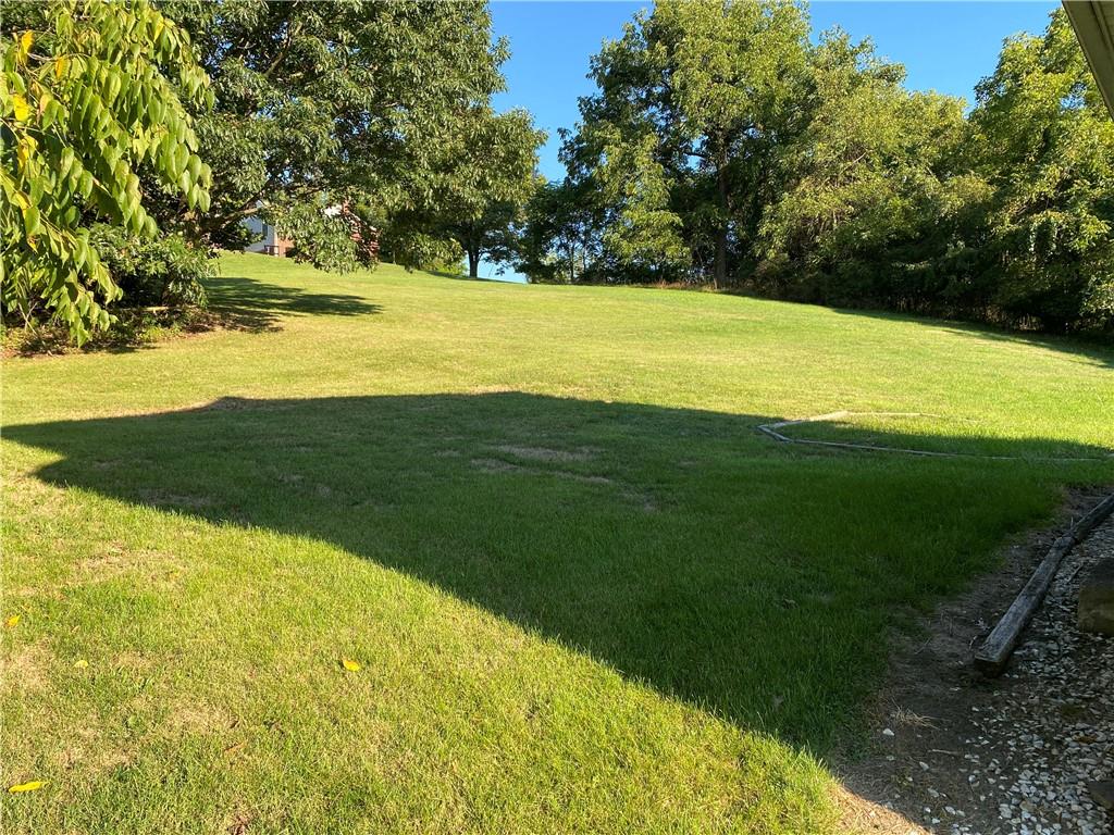 906 Maple Street Ruffs Dale, PA 15679 - Photo 5 of 13 a view of an ocean from a yard
