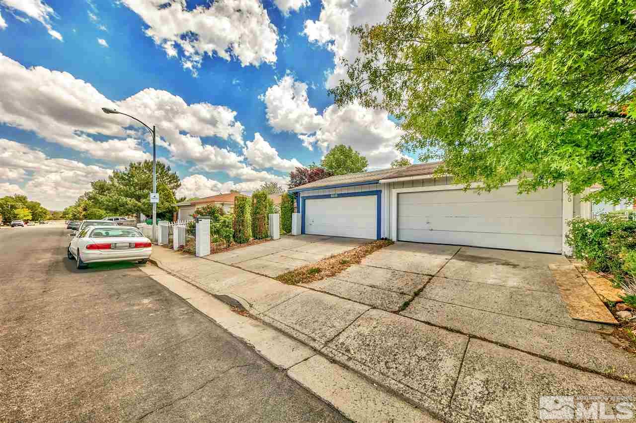 6640 Lotus Street Reno, NV 89506 - Photo 20 of 20 a couple of cars parked in front of a house