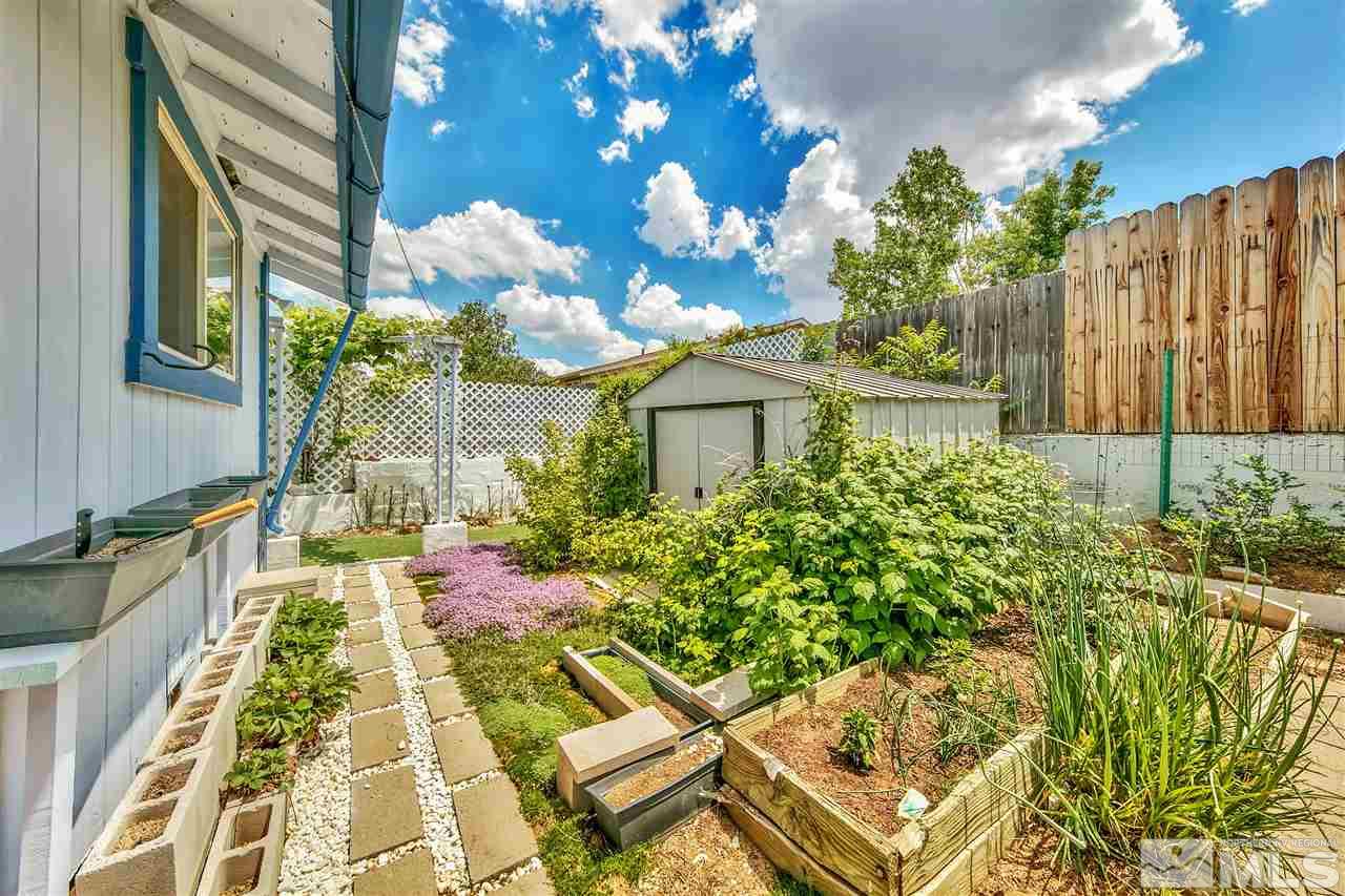 6640 Lotus Street Reno, NV 89506 - Photo 5 of 20 a front view of a house with a yard