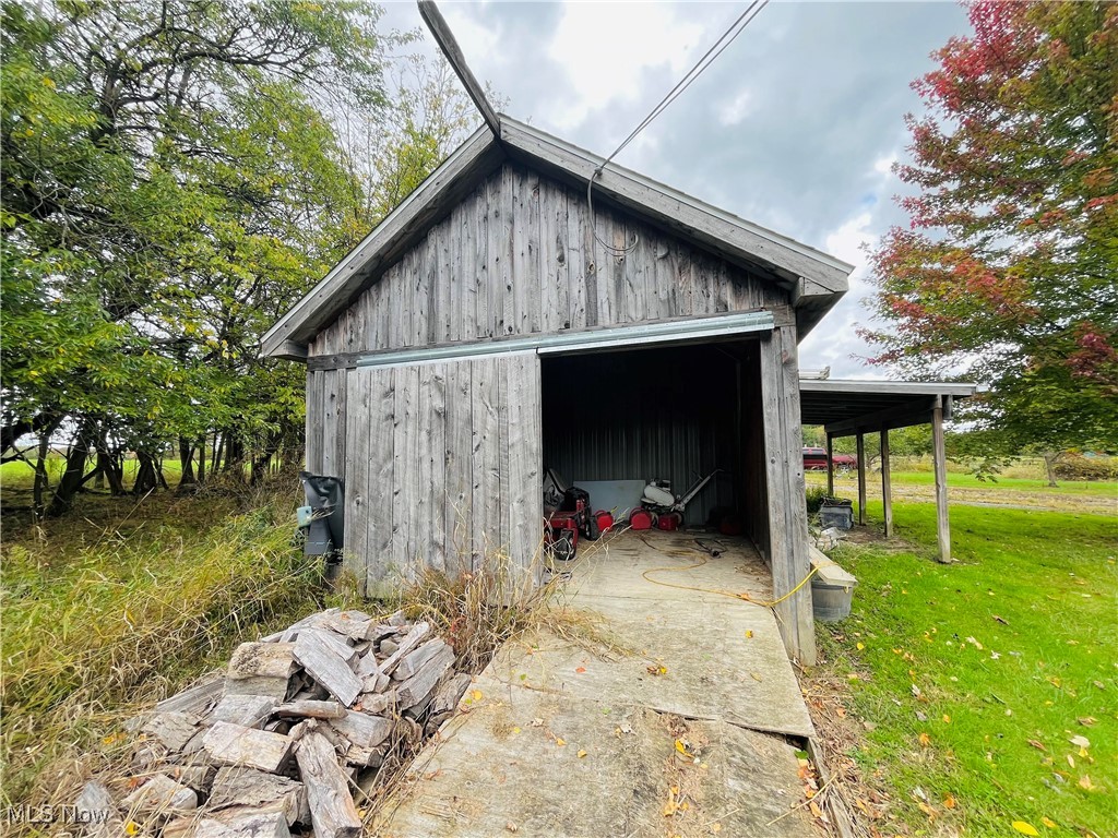 2687 Griggs Road Jefferson, OH 44047 - Photo 28 of 41 View of outbuilding featuring a yard