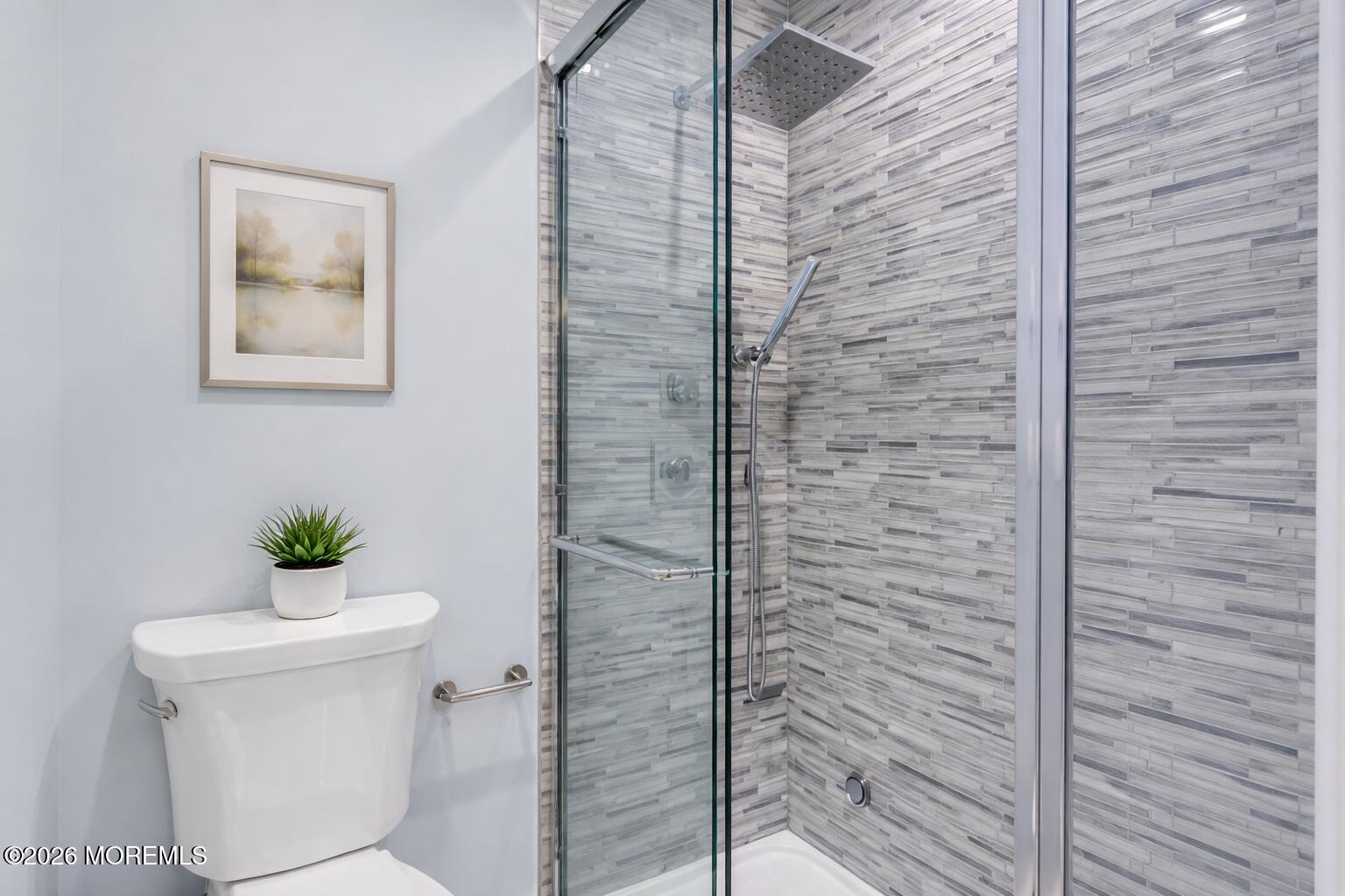 22 Claremont Court Red Bank, NJ 07701 - Photo 14 of 28 a bathroom with a toilet and a shower