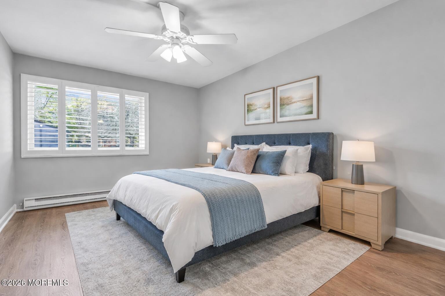 22 Claremont Court Red Bank, NJ 07701 - Photo 15 of 28 a spacious bedroom with a bed and a window