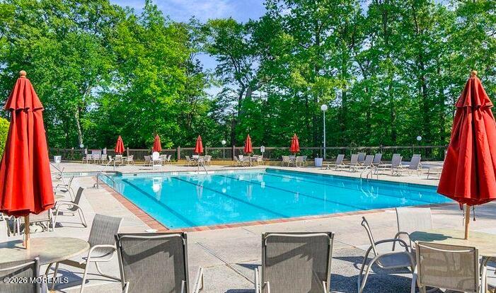 22 Claremont Court Red Bank, NJ 07701 - Photo 19 of 28 a view of house with swimming pool and chair
