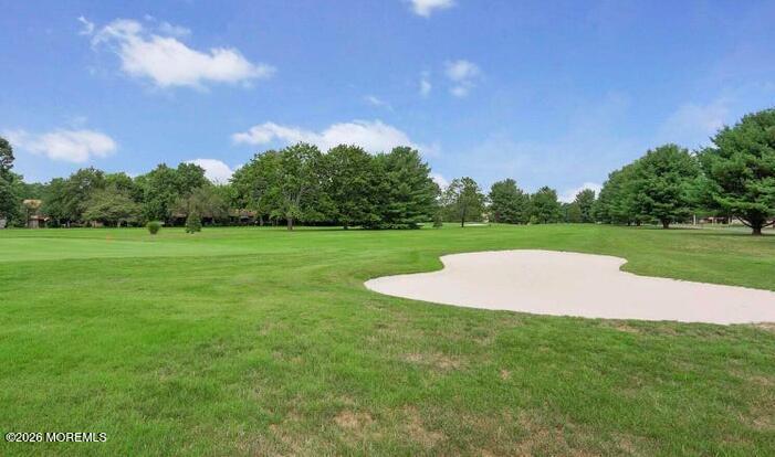 22 Claremont Court Red Bank, NJ 07701 - Photo 20 of 28 a view of a field and trees in the background