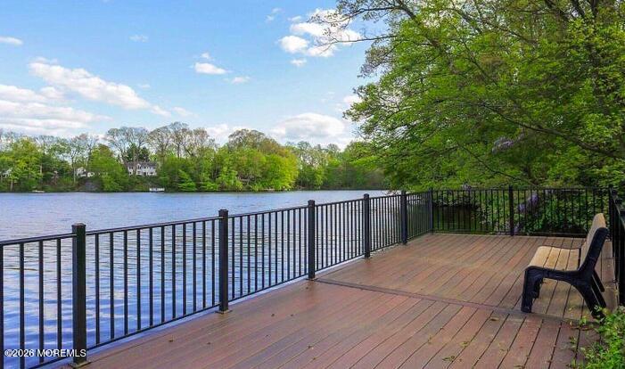 22 Claremont Court Red Bank, NJ 07701 - Photo 21 of 28 a balcony with wooden floor and fence