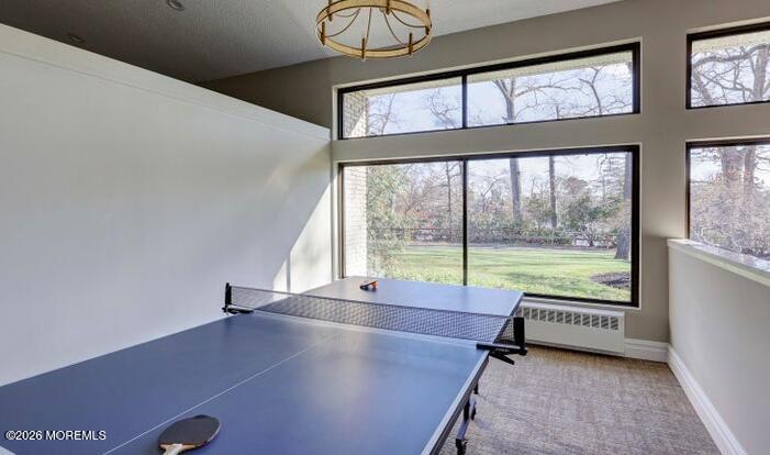 22 Claremont Court Red Bank, NJ 07701 - Photo 26 of 28 a view of a living room and floor to ceiling window