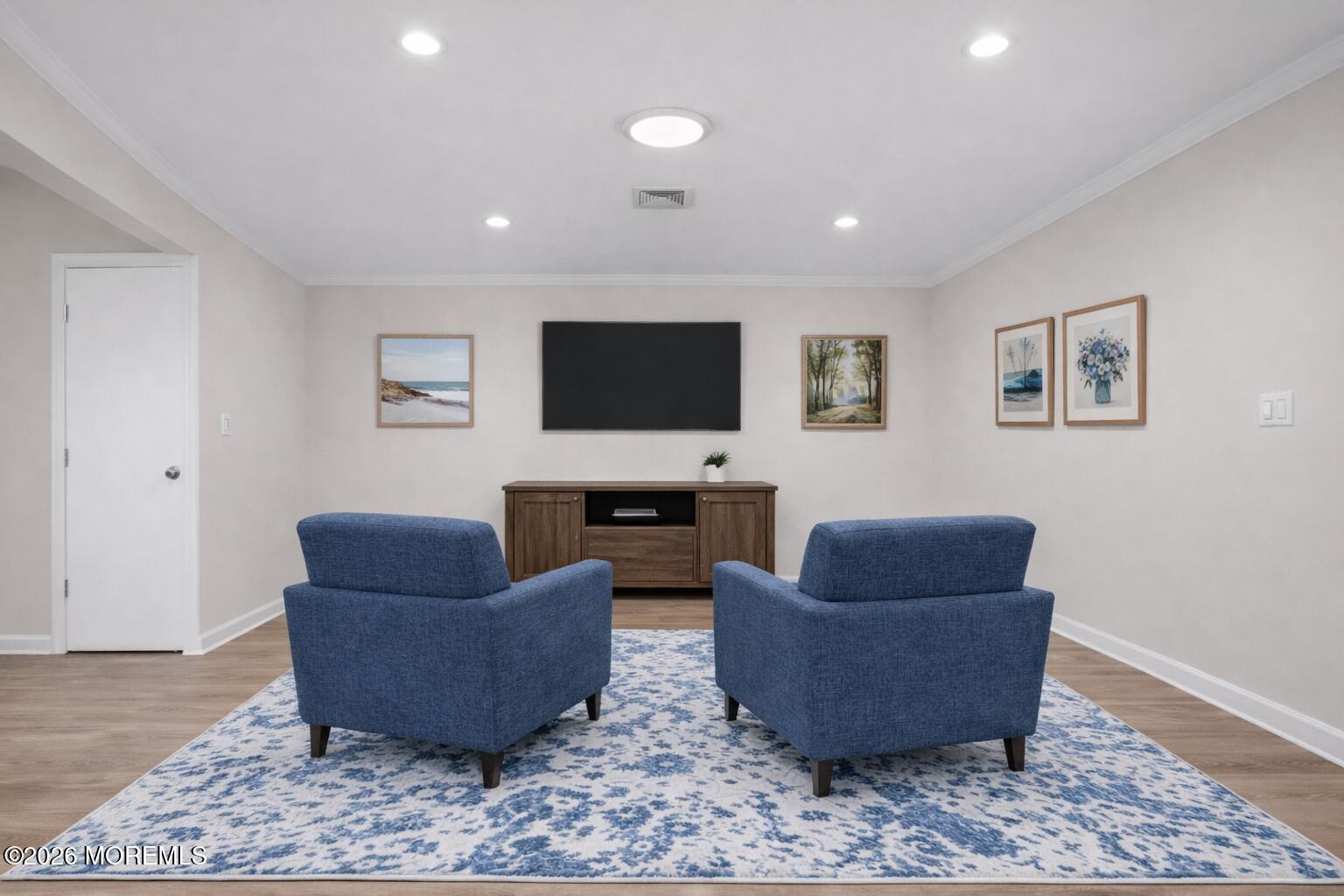 22 Claremont Court Red Bank, NJ 07701 - Photo 8 of 28 a living room with furniture and a flat screen tv