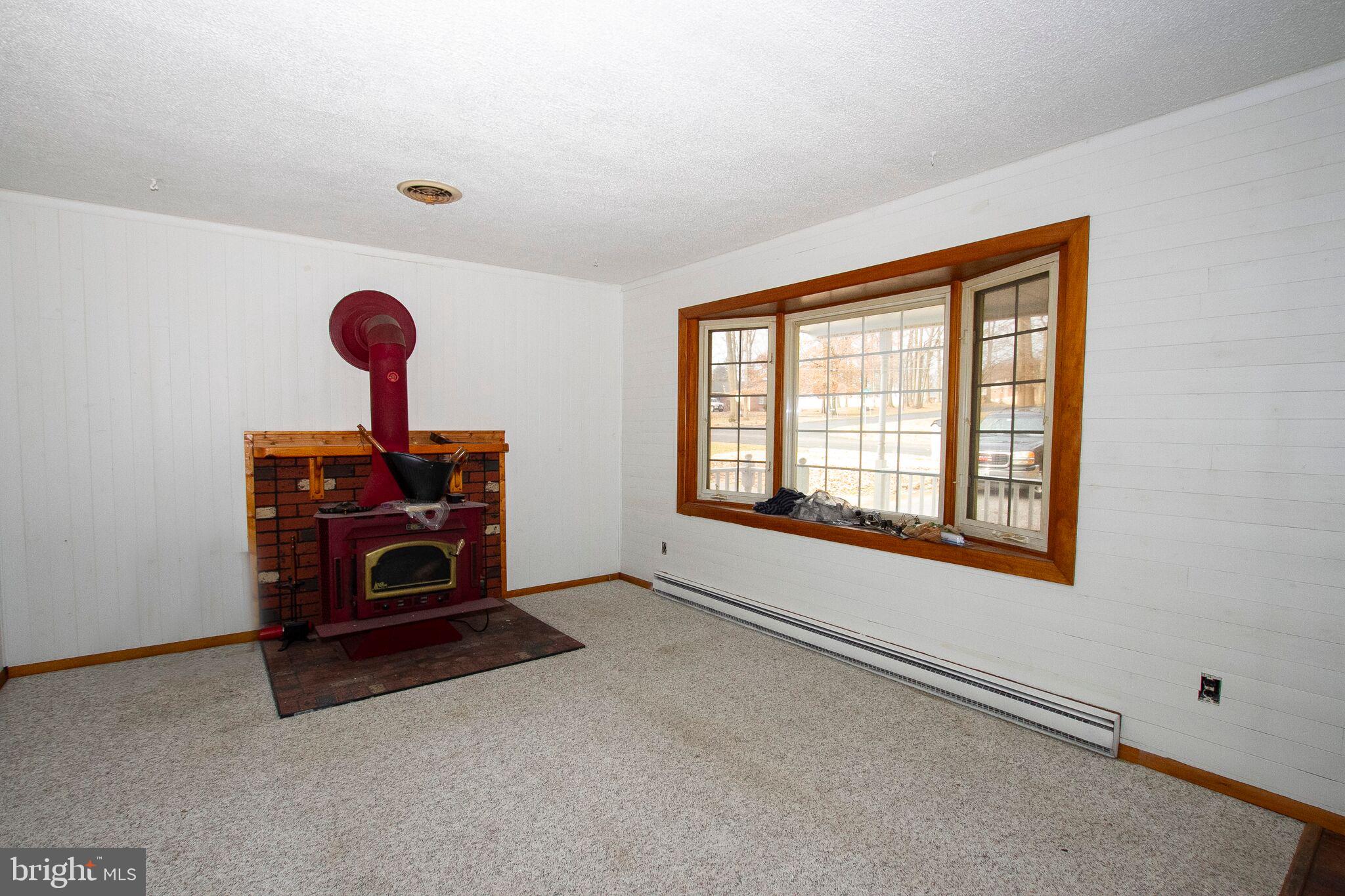 3613 Hays Road Aberdeen, MD 21001 - Photo 3 of 19 WOOD STOVE IN LIVING ROOM