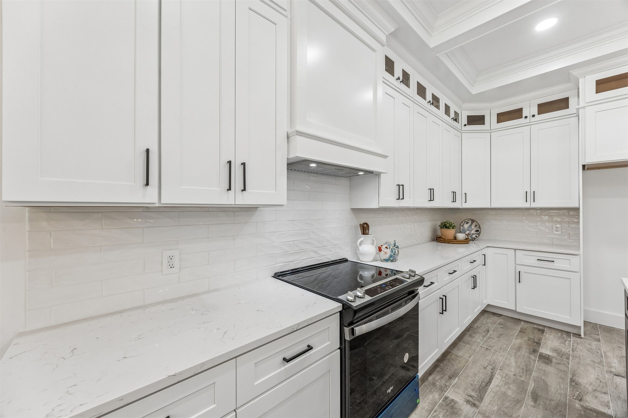 95121 North Ellis Landing Road Fernandina Beach, FL 32034 - Photo 10 of 37 a kitchen with granite countertop white cabinets and white appliances