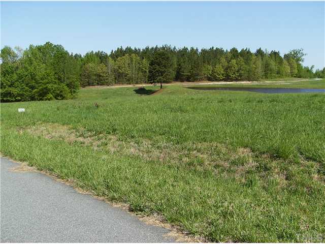 Burlington Road, Unit 5 Roxboro, NC 27574 - Photo 2 of 2 a view of grassy field with trees