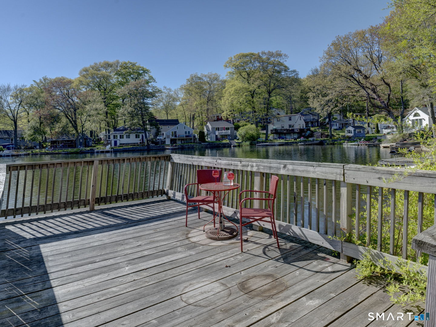 339 Ference Road Ashford, CT 06278 - Photo 12 of 16 a view of a wooden deck with a lake