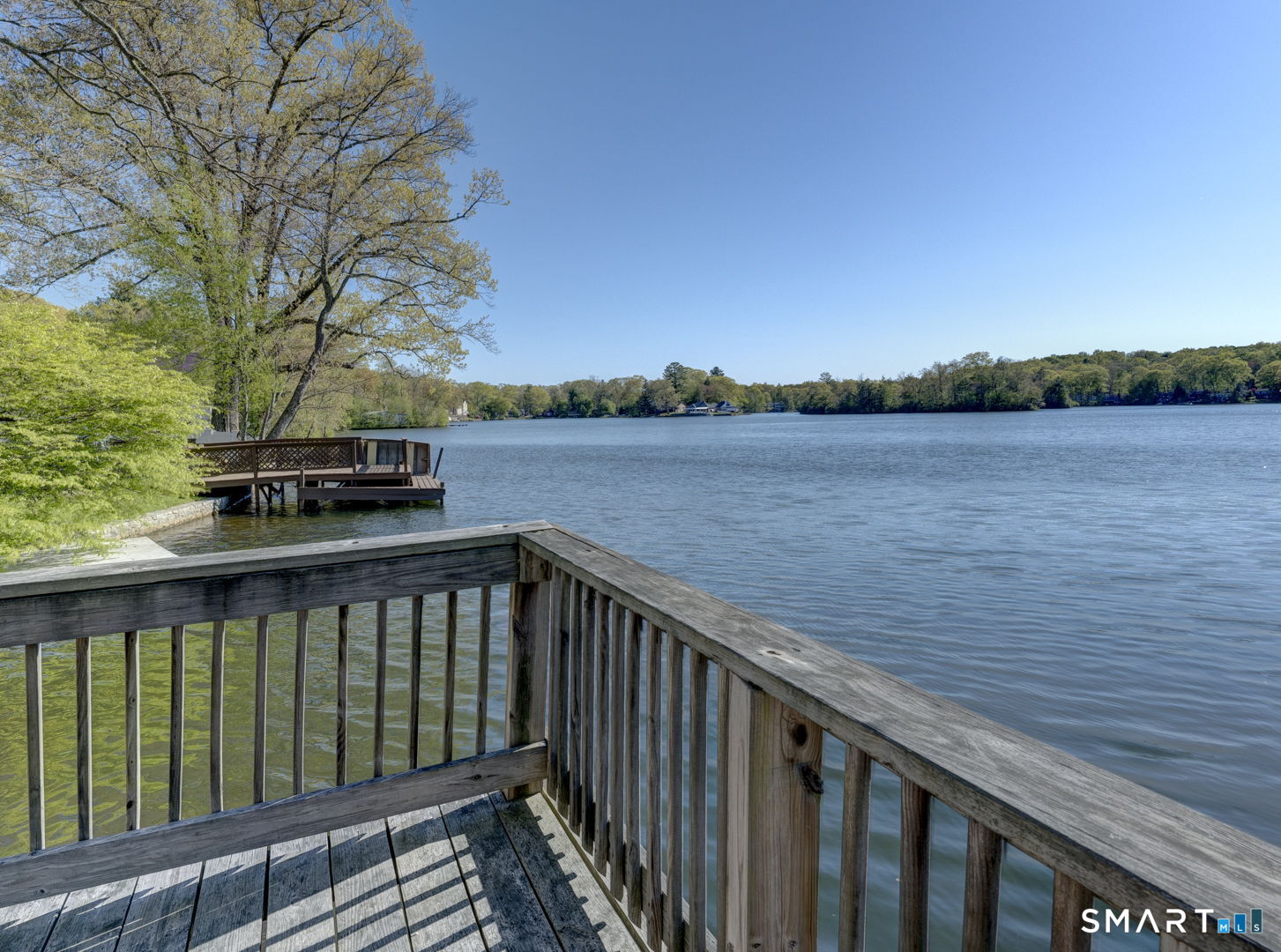 339 Ference Road Ashford, CT 06278 - Photo 13 of 16 a balcony with wooden floor and lake view