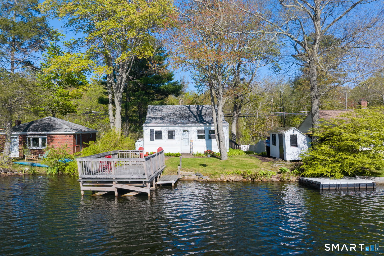339 Ference Road Ashford, CT 06278 - Photo 15 of 16 a small pool with a table and chairs under an umbrella
