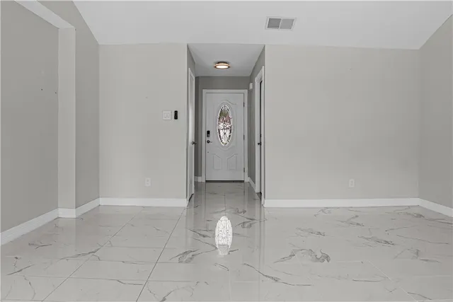 a view of a hallway with closet