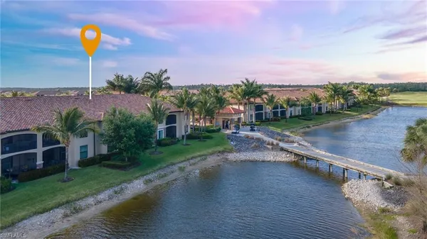 a view of a street with a building in the background