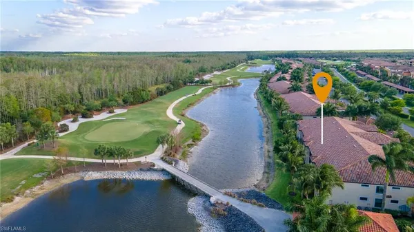 an aerial view of a house with outdoor space lake houses and lake view