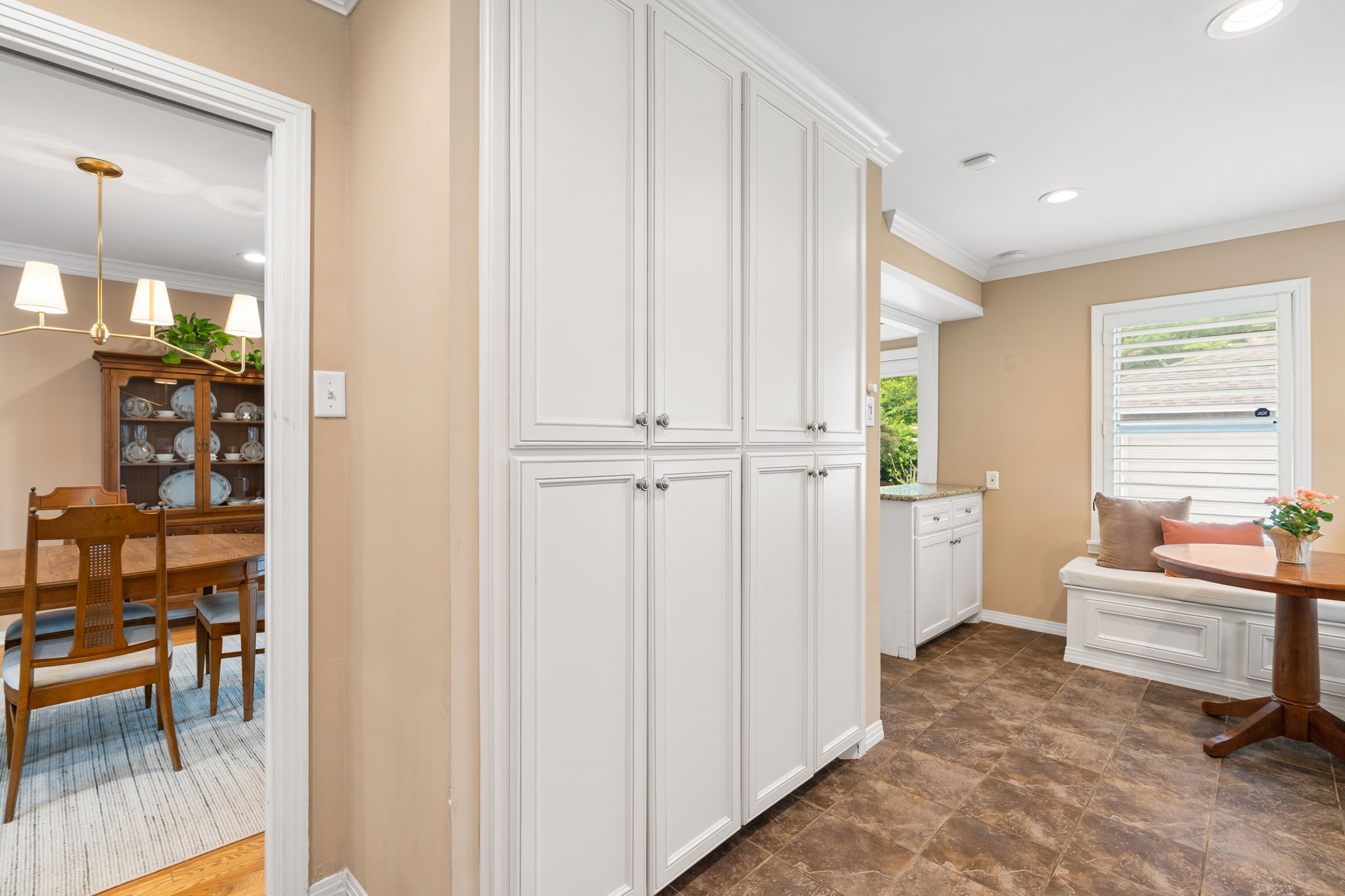 1115 Woodhill Road Houston, TX 77008 - Photo 6 of 29 These tall kitchen cabinets have an abundance of storage space with convenient pull out shelving.