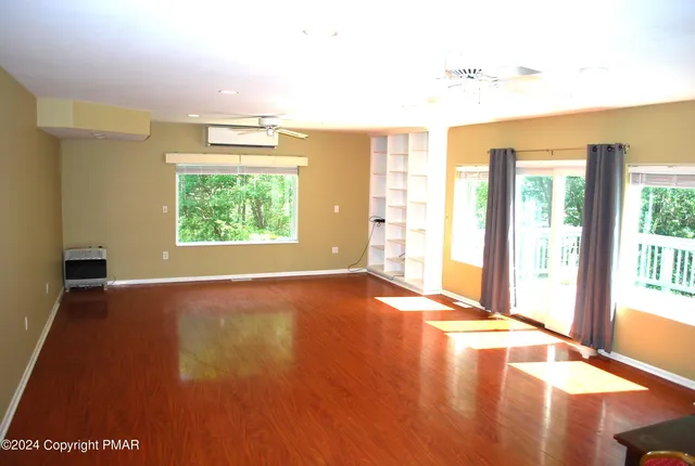 a kitchen with stainless steel appliances granite countertop a sink a stove and dishwasher