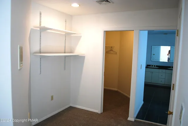 a view of a kitchen with a sink