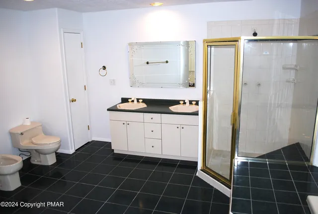 a view of a tree in the middle of a yard