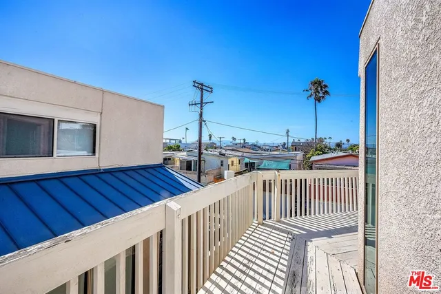a view of a city from a roof deck