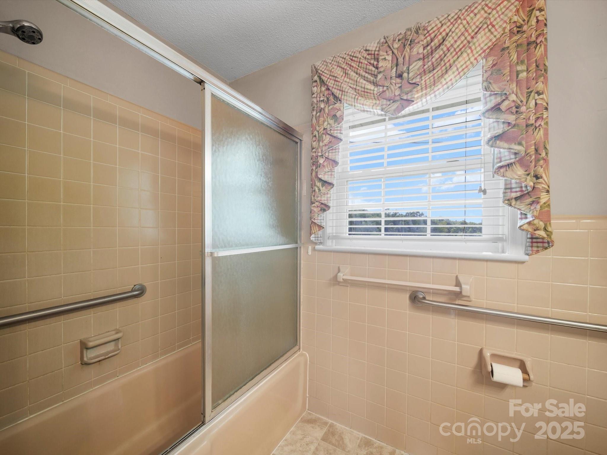 1497 White Store Road Pageland, SC 29728 - Photo 22 of 43 a bathroom with a bathtub and a shower