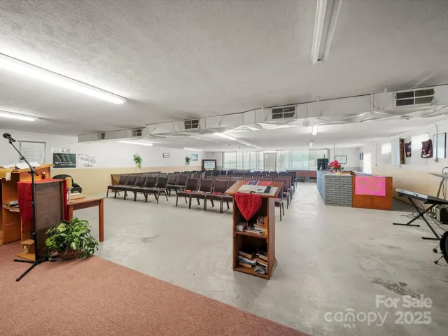 a storage room with lots of wooden furniture