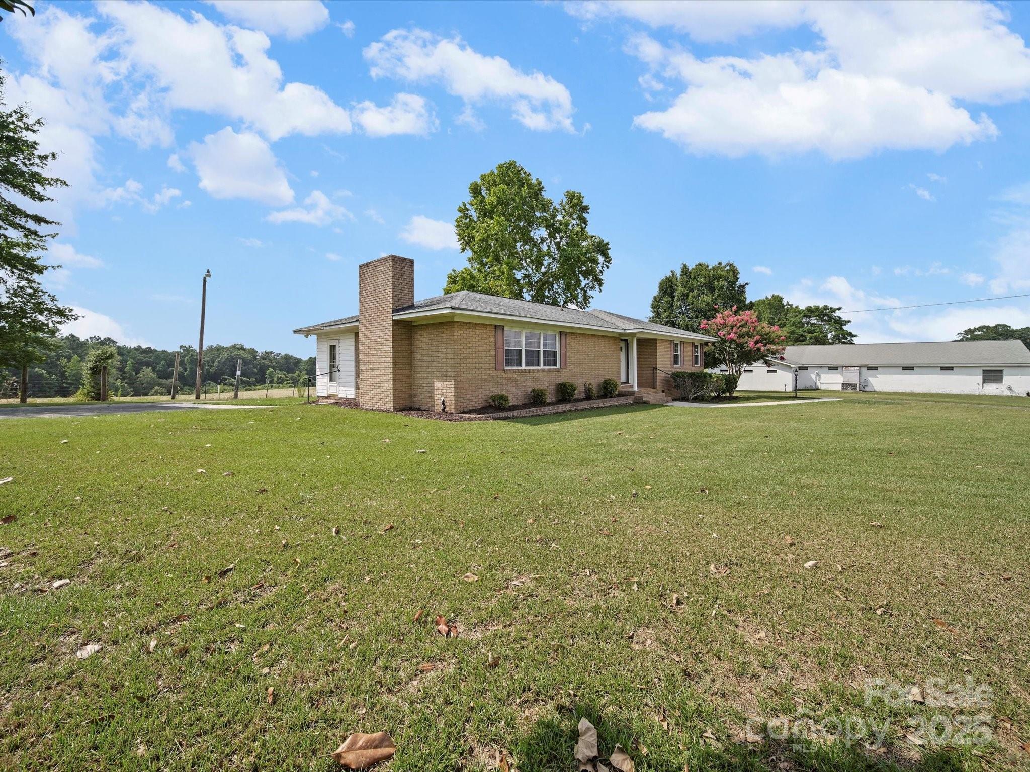 1497 White Store Road Pageland, SC 29728 - Photo 6 of 43 a view of a house with a big yard