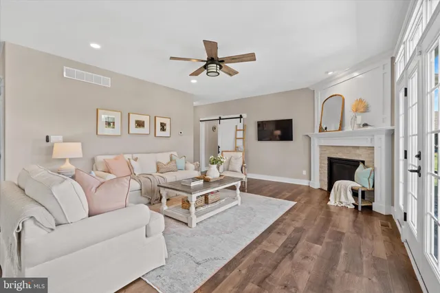 a view of a livingroom with furniture and closet