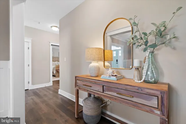 a utility room with cabinets washer and dryer