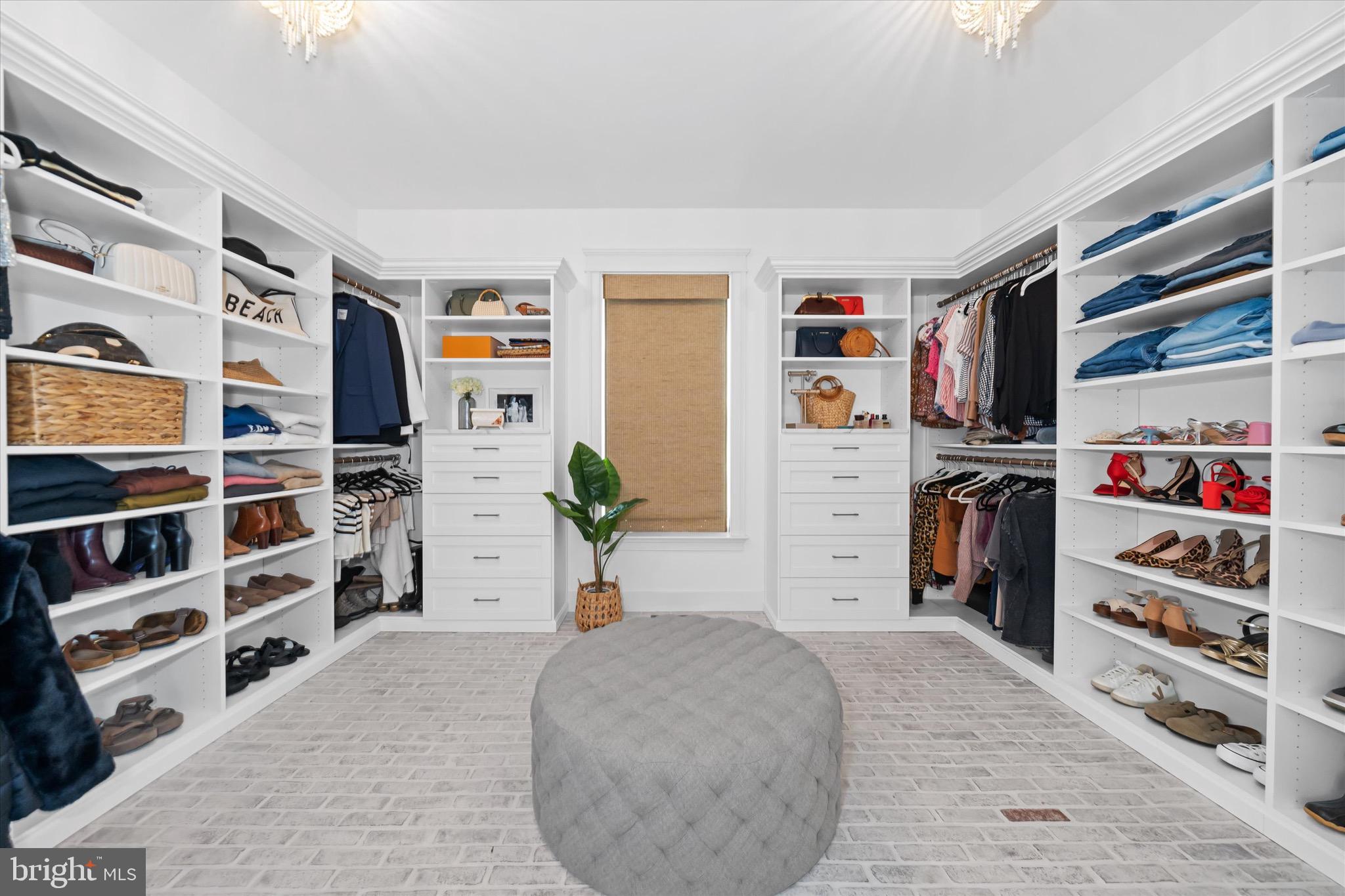 1215 Bunker Hill Road Middletown, DE 19709 - Photo 25 of 54 a view of walk in closet with clothes and shoes