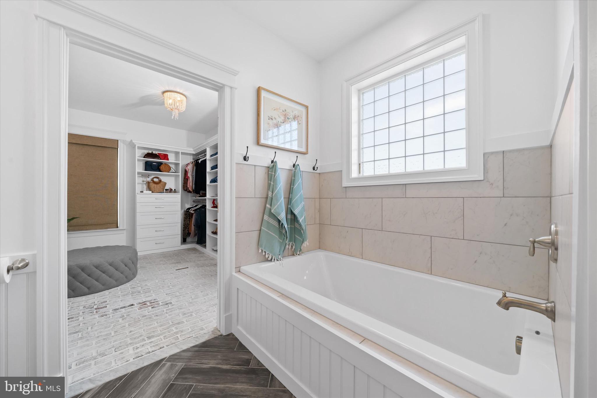 1215 Bunker Hill Road Middletown, DE 19709 - Photo 26 of 54 a bathroom with a bathtub and a shower