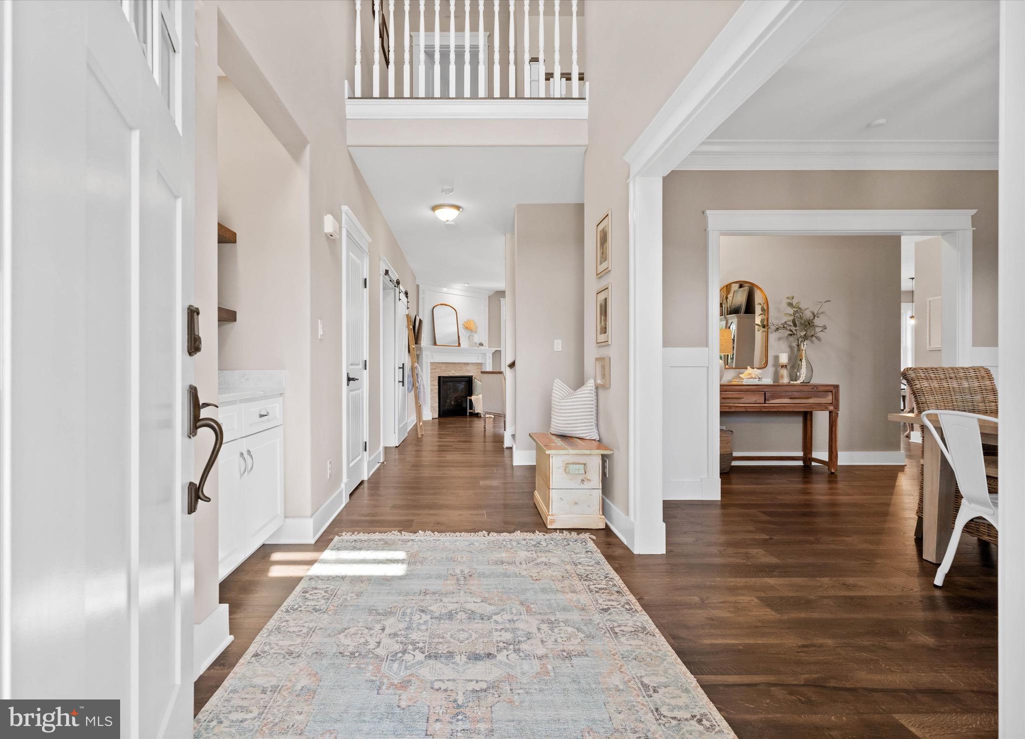 1215 Bunker Hill Road Middletown, DE 19709 - Photo 35 of 54 a view of a hallway view with wooden floor and a living room