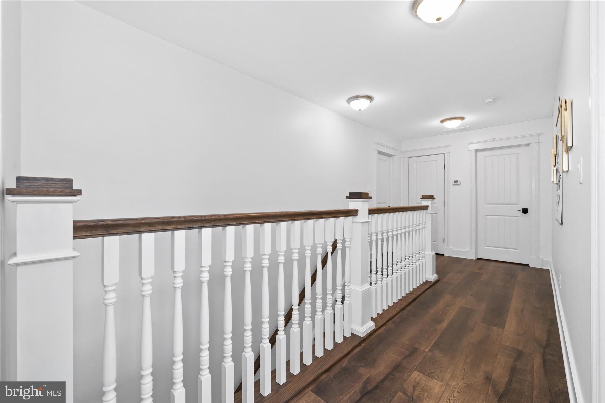 1215 Bunker Hill Road Middletown, DE 19709 - Photo 51 of 54 a view of a hallway with wooden floor