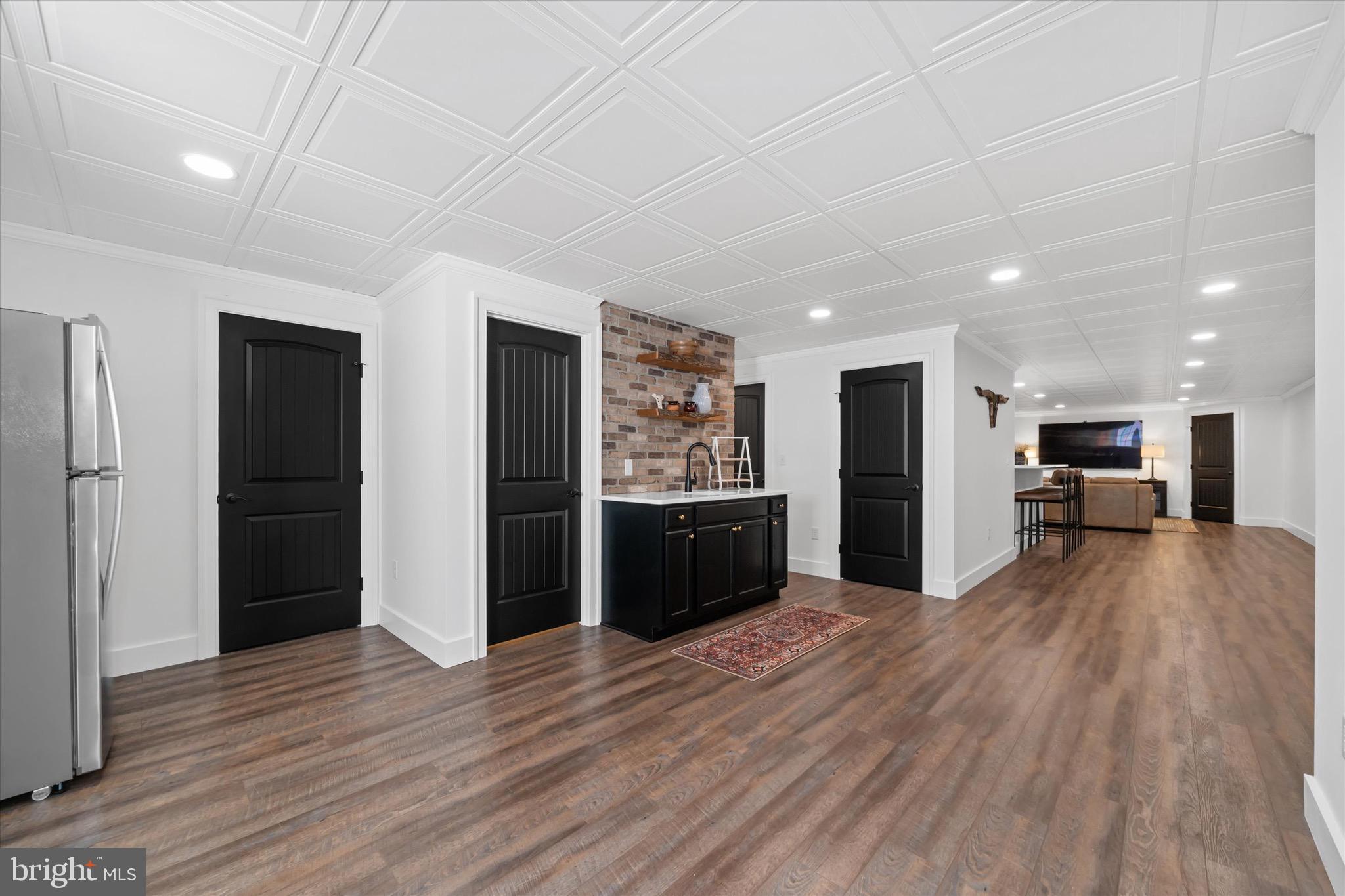 1215 Bunker Hill Road Middletown, DE 19709 - Photo 52 of 54 a view of a big room with wooden floor