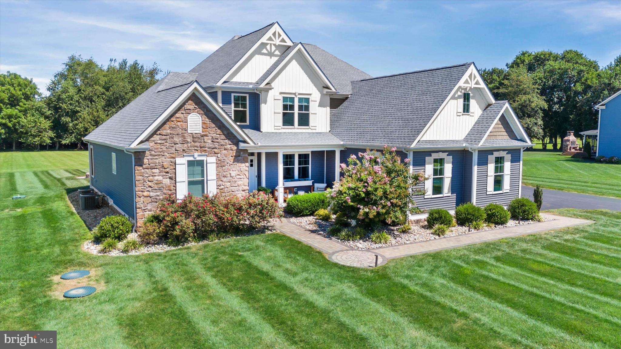1215 Bunker Hill Road Middletown, DE 19709 - Photo 7 of 54 a front view of a house with a yard and porch